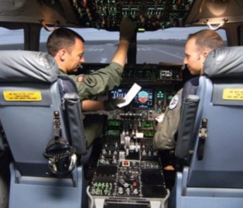 Two USAF pilots in flight deck on runway prior to takeoff at Altus Air Force Base in Altus, OK