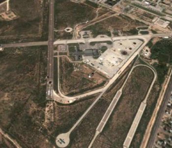 Aerial view of runway and buildings at Goodfellow Air Force Base in San Angelo, TX