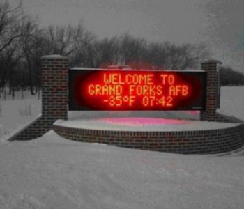 Welcome sign showing temperature of -35F at Grand Forks Air Force Base in Emerado, ND