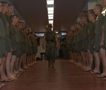 Marine Corps Drill Instructor inspecting trainees at MCRD Parris Island Marine Corps Base in Port Royal, SC