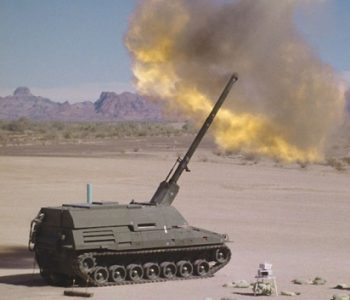 Military artillery firing large shell at Yuma Proving Ground Army Base in Yuma County, AZ