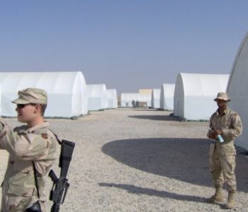 Soldiers standing in Tent City in Camp Buehring Army Base in Udari, Kuwait