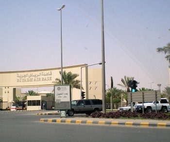 A truck driving down a street at Riyadh Air Force Base in Riyadh, SAUDI ARABIA