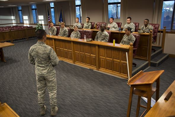 US military members serving on a jury during a court martial.
