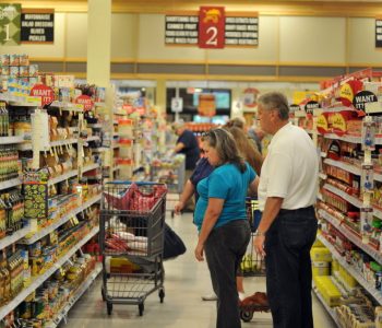 Shoppers buying groceries at the El Centro NAF Commissary