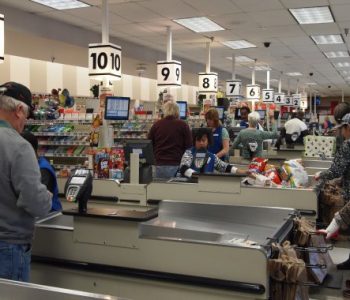 Shoppers in the check out lane at the Forest Glen Commissary
